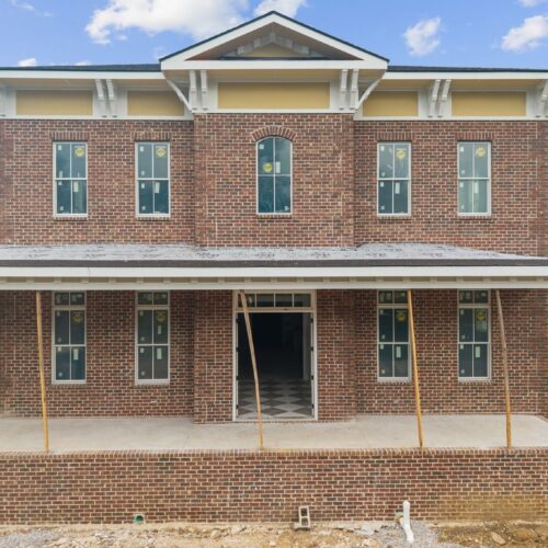 A brick home built by defatta custom homes
